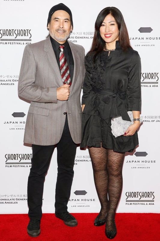 Chris Tashima wearing FORTUNA Tokyo necktie at film festival.